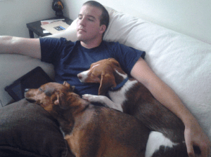 snuggling with a dog